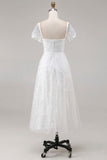 Robe de mariée midi en dentelle ivoire avec manches courtes