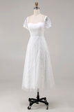 Robe de mariée midi en dentelle ivoire avec manches courtes