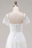Robe de mariée midi en dentelle ivoire avec manches courtes