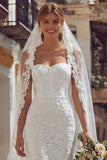 Robe de mariée midi ivoire bustier dentelle à bretelles spaghetti