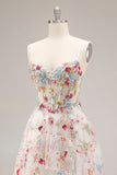 Robe de soirée longue ivoire ligne A bustier transparent brodée de fleurs avec fente et volants