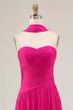 Fuchsia Sweetheart Une robe de bal longue plissée avec une ceinture