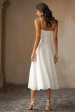 Robe de mariée midi en mousseline de soie blanche à bretelles spaghetti