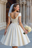 Robe de mariée courte ivoire avec nœud de la Shouder