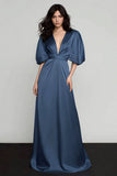 Robe formelle bleu foncé en satin à manches en V à manches bouffantes