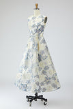 Robe longue bleu poussiéreux ligne A en jacquard fleuri avec poches