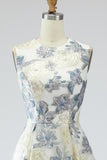 Robe longue bleu poussiéreux ligne A en jacquard fleuri avec poches