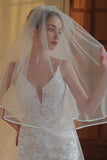 Long voile de mariée en tulle ivoire