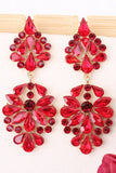 Boucles d’oreilles longues en forme de fleurs roses scintillantes avec des strass