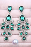 Longues boucles d’oreilles de bal en forme de feuille vert foncé scintillantes avec des strass