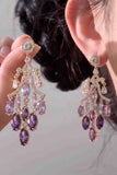 Boucles d’oreilles tombantes en forme de feuille de strass violettes scintillantes