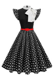 Robe des années 1950 à pois noirs à col montant A Line avec nœud