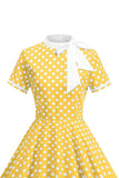 Robe à pois noirs à col haut avec un nœud A Line des années 1950