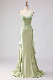 Robe de soirée sirène longue bustier perlé vert clair à volants et dos lacé