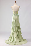 Robe de soirée sirène longue bustier perlé vert clair à volants et dos lacé
