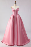 Robe de bal longue en satin rose poudré à la ligne structurée et jupe ample