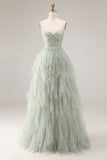 Longue robe de bal en tulle vert poussiéreux en ligne A à bretelles fines Corset avec volants