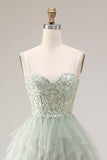 Longue robe de bal en tulle vert poussiéreux en ligne A à bretelles fines Corset avec volants