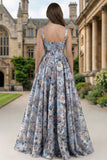 Corset bleu Une robe longue à fleurs à col carré imprimée en ligne avec fente