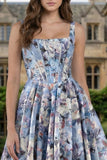 Corset bleu Une robe longue à fleurs à col carré imprimée en ligne avec fente