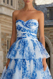 Robe midi sans bretelles blanche bleue, fleur bleue et volants