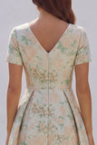 Robe d'invitée de mariage midi imprimé floral bleu et blanc ligne A manches courtes