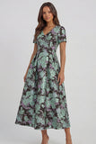 Robe d'invitée de mariage midi imprimé floral bleu et blanc ligne A manches courtes