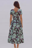 Robe d'invitée de mariage midi imprimé floral bleu et blanc ligne A manches courtes