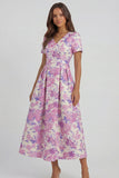 Robe d'invitée de mariage midi imprimé floral bleu et blanc ligne A manches courtes