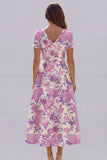 Robe d'invitée de mariage midi imprimé floral bleu et blanc ligne A manches courtes
