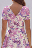 Robe d'invitée de mariage midi imprimé floral bleu et blanc ligne A manches courtes