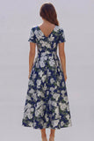 Robe d'invitée de mariage midi imprimé floral bleu et blanc ligne A manches courtes