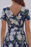 Robe d'invitée de mariage midi imprimé floral bleu et blanc ligne A manches courtes