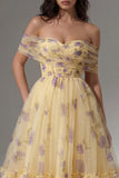 Robe midi en tulle jaune à fleurs dénusées avec volants