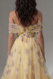 Robe midi en tulle jaune à fleurs dénusées avec volants