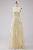 Robe de soirée longue jaune ligne A à bretelles dos lacé avec broderies florales