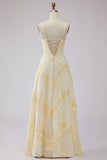 Robe de soirée longue jaune ligne A à bretelles dos lacé avec broderies florales