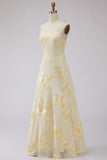 Robe de soirée longue jaune ligne A à bretelles dos lacé avec broderies florales