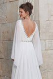 Chiffon ivoire scintillant Une robe de mariée longue à col en V avec fente