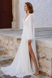 Robe de mariée longue à manches bouffantes à col en V en ivoire avec fente