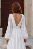 Robe de mariée longue à manches bouffantes à col en V en ivoire avec fente