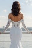 Robe de mariée en traîne sirène à épaules dénudée ivoire avec dentelle