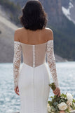 Robe de mariée en traîne à balayage d’épaule en mer ivoire avec fente