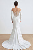 Robe de mariée longue en sirène en ivoire avec des appliques