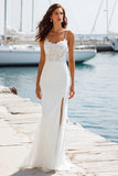 Robe de mariée longue à bretelles fines en ivoire avec appliquement de sirène et fente
