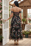 Robe d'invitée de mariage midi noire tulle ligne A bustier floral épaules dénudées appliqué