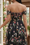 Robe d'invitée de mariage midi noire tulle ligne A bustier floral épaules dénudées appliqué
