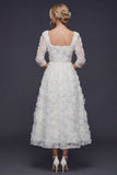 Robe de mariée longue blanche à manches 3/4 avec fleurs 3D