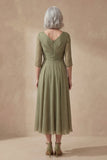 Une robe midi midi à col en V à col en V poussiéreux en ligne sauge poussiéreuse