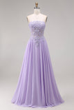 Robe de bal longue lilas tulle bustier ligne A appliquée